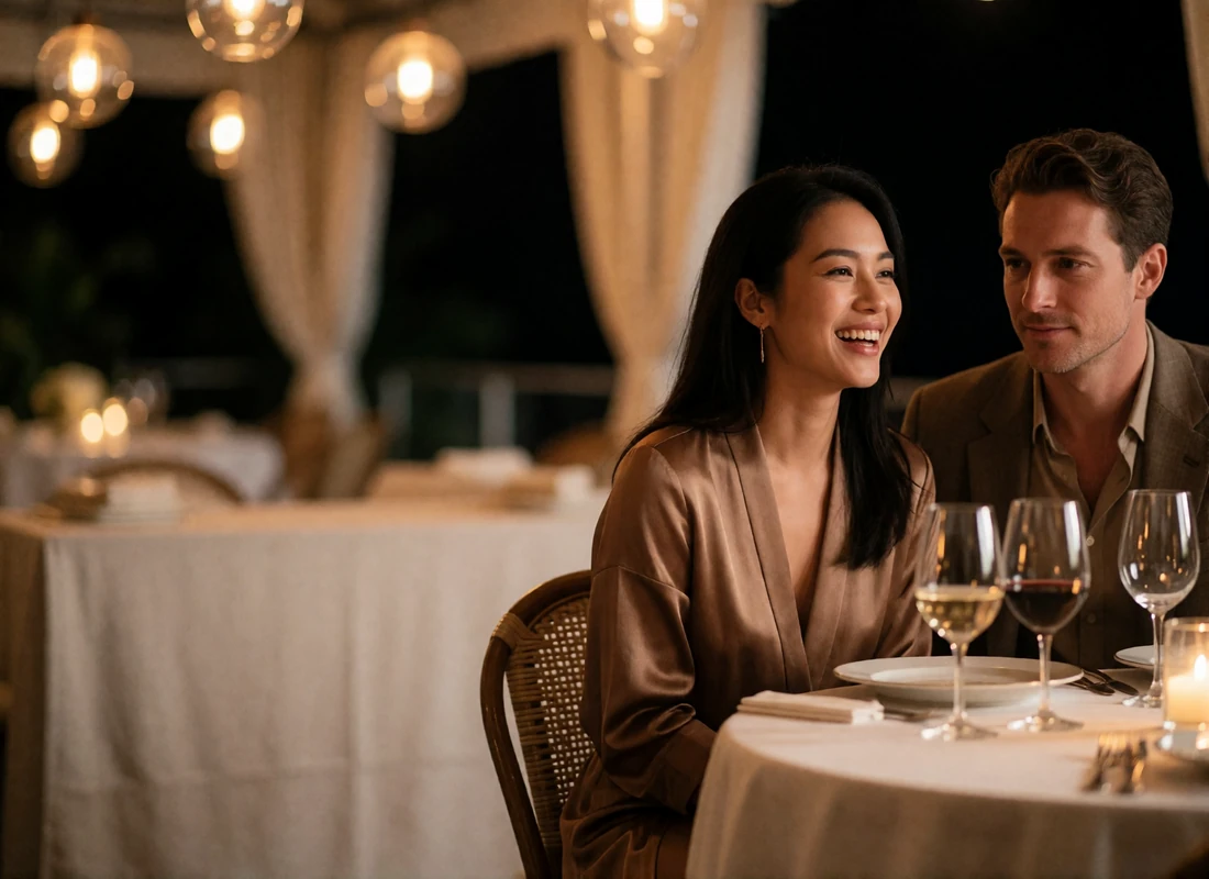 Couple sharing a quiet dinner on a fine-dining terrace at night, representing the stage after a first international meeting